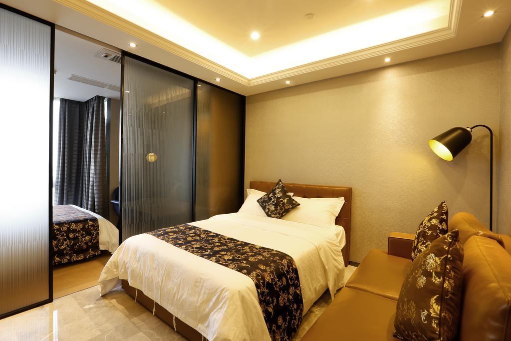 Boman Holiday Apartment Bei Jing Lu Jie Deng Du Hui Branch Cantão Exterior foto