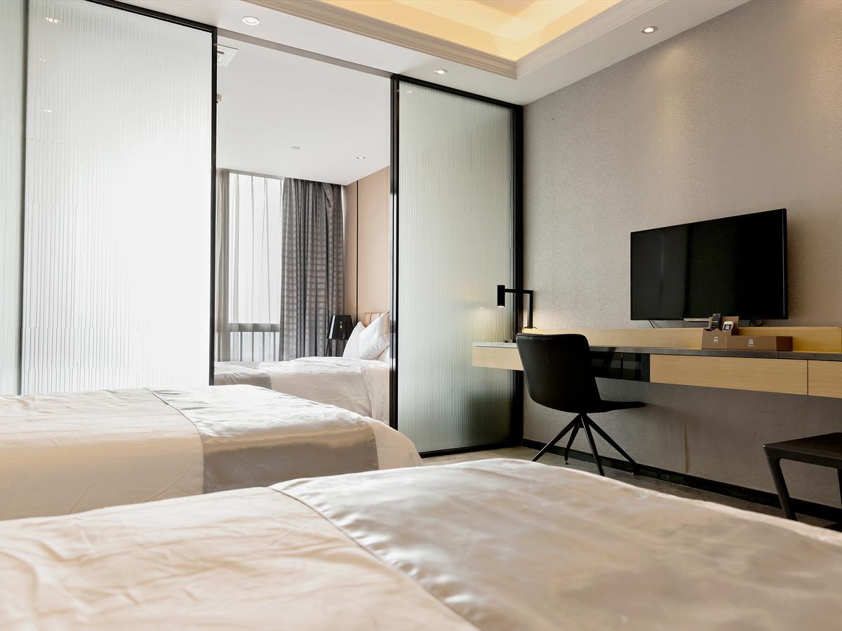 Boman Holiday Apartment Bei Jing Lu Jie Deng Du Hui Branch Cantão Exterior foto